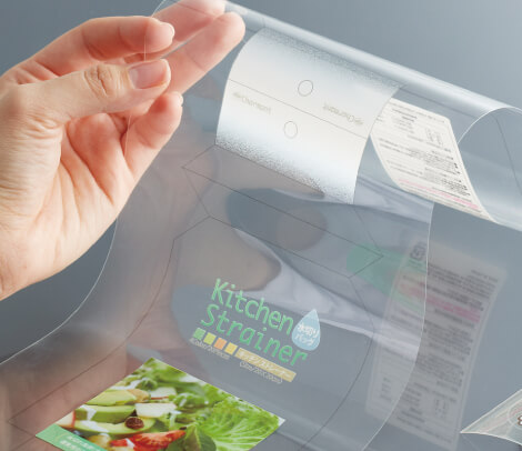 明光舎印刷所、「透明軟包装ラベルの試作」30%値下げ